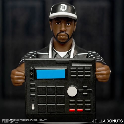 ReAction Figures - J Dilla - W01 - J Dilla (Donuts - Smile Album Cover)